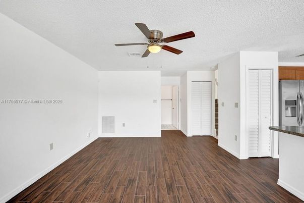 Empty room, Interior, Kitchen, Stainless Steel Appliances, Wood Texture Flooring