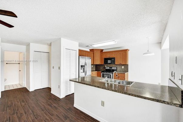 Interior, Kitchen, Pendant Lights, Stainless Steel Appliances, Wood Texture Flooring