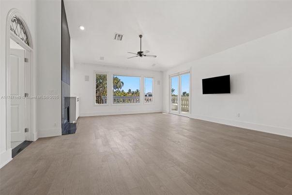 Empty room, Fireplace, Interior, Recessed Lighting, Wood Texture Flooring