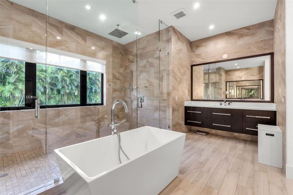 Bathroom, Dual Sink Vanities, Free Standing Baths, Glass Shower, Interior, Recessed Lighting, Wood Texture Flooring