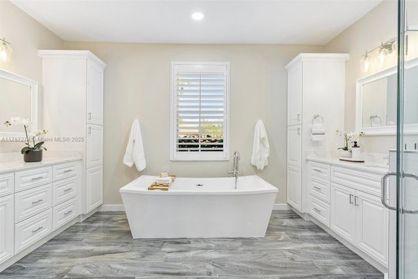Bathroom, Dual Sink Vanities, Free Standing Baths, Interior, Recessed Lighting, Wood Texture Flooring