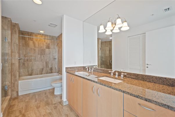 Bathroom, Dual Sink Vanities, Interior, Recessed Lighting, Wood Texture Flooring