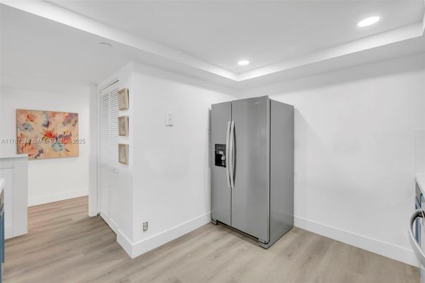 Interior, Recessed Lighting, Stainless Steel Appliances, Wood Texture Flooring