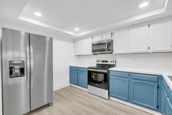 Interior, Kitchen, Recessed Lighting, Stainless Steel Appliances, Wood Texture Flooring