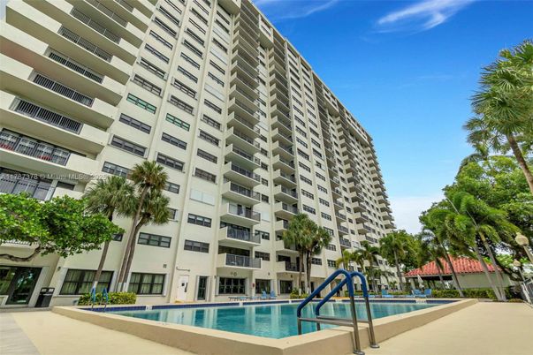 Exterior, Facade, Pool, Condo Building