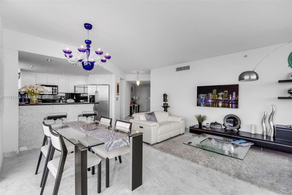 Chandelier, Dining room, Interior, Kitchen, Living room, Marble, Pendant Lights, Recessed Lighting, Stainless Steel Appliances