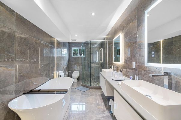 Bathroom, Dual Sink Vanities, Free Standing Baths, Glass Shower, Interior, Recessed Lighting