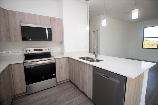 Interior, Kitchen, Pendant Lights, Stainless Steel Appliances, Wood Texture Flooring