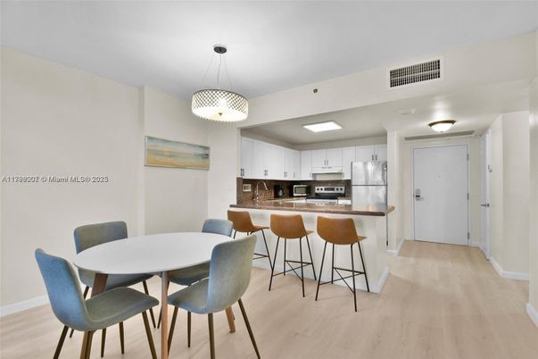 Dining room, Interior, Kitchen, Pendant Lights, Stainless Steel Appliances, Wood Texture Flooring