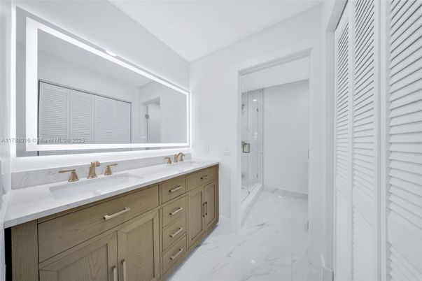 Bathroom, Dual Sink Vanities, Glass Shower, Interior, Marble, Recessed Lighting