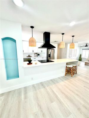 Dining room, Interior, Kitchen, Pendant Lights, Stainless Steel Appliances, Wood Texture Flooring