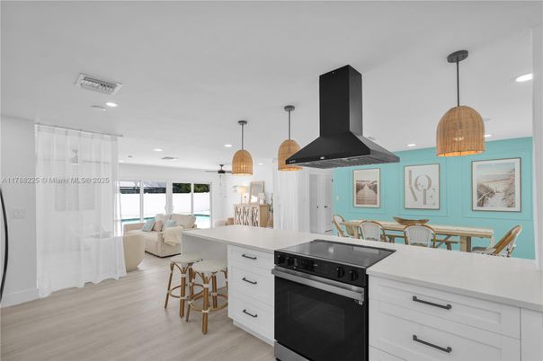 Dining room, Interior, Kitchen, Living room, Pendant Lights, Recessed Lighting, Stainless Steel Appliances, Wood Texture Flooring
