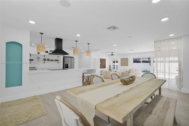 Dining room, Interior, Kitchen, Pendant Lights, Recessed Lighting, Stainless Steel Appliances, Wood Texture Flooring