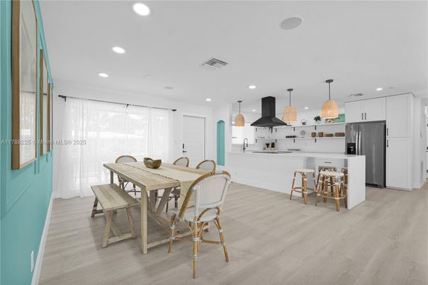 Dining room, Interior, Kitchen, Pendant Lights, Recessed Lighting, Stainless Steel Appliances, Wood Texture Flooring