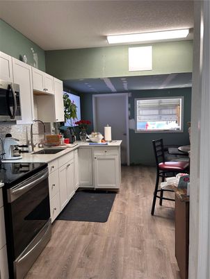 Dining room, Interior, Kitchen, Stainless Steel Appliances, Wood Texture Flooring
