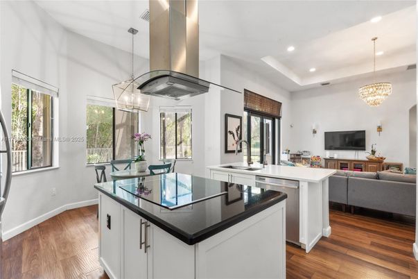 Chandelier, Dining room, Interior, Kitchen, Living room, Pendant Lights, Recessed Lighting, Wood Texture Flooring