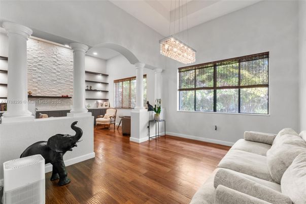 Chandelier, Fireplace, Interior, Living room, Recessed Lighting, Wood Texture Flooring