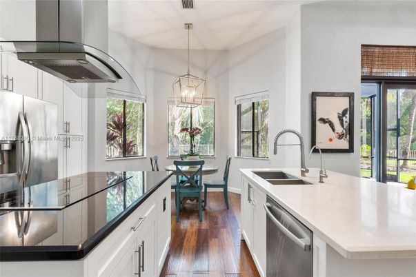 Dining room, Interior, Kitchen, Pendant Lights, Stainless Steel Appliances, Wood Texture Flooring