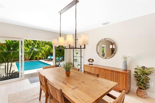 Dining room, Interior, Pendant Lights, Pool, Wood Texture Flooring