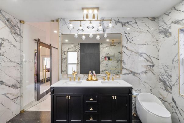 Bathroom, Dual Sink Vanities, Glass Shower, Interior, Marble Walls