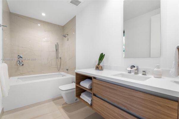Bathroom, Dual Sink Vanities, Interior, Marble Walls, Recessed Lighting