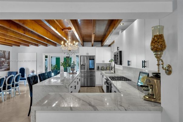 Chandelier, Dining room, Interior, Kitchen, Recessed Lighting, Stainless Steel Appliances, Wooden Beams, Wooden Ceilings