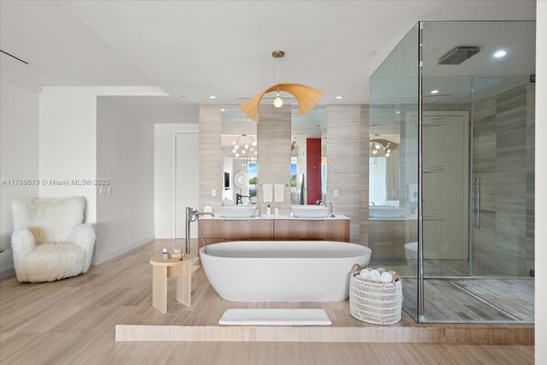 Bathroom, Free Standing Baths, Glass Shower, Interior, Pendant Lights, Recessed Lighting, Wood Texture Flooring