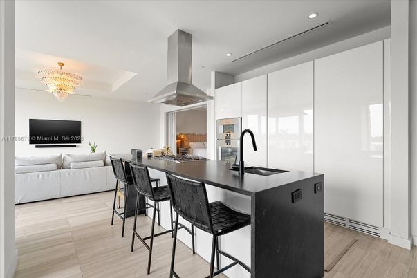 Chandelier, Dining room, Interior, Kitchen, Living room, Recessed Lighting, Stainless Steel Appliances, Wood Texture Flooring