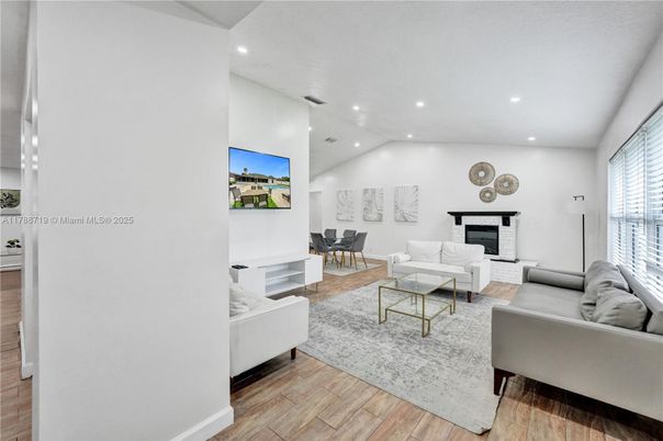 Fireplace, Interior, Living room, Recessed Lighting, Wood Texture Flooring