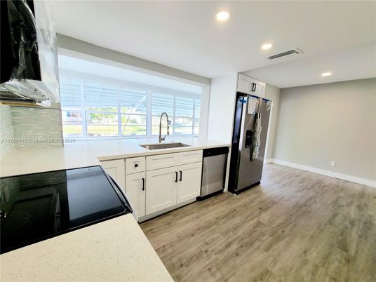 Interior, Kitchen, Recessed Lighting, Stainless Steel Appliances, Wood Texture Flooring
