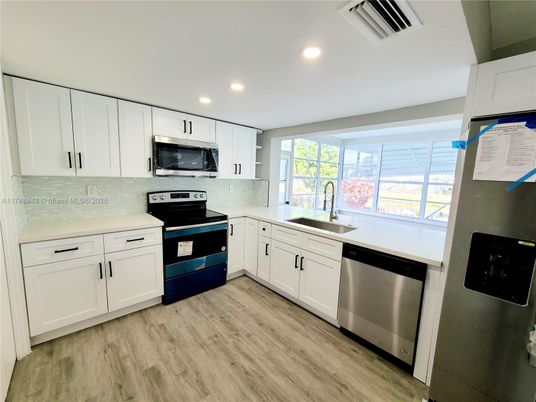 Interior, Kitchen, Recessed Lighting, Stainless Steel Appliances, Wood Texture Flooring
