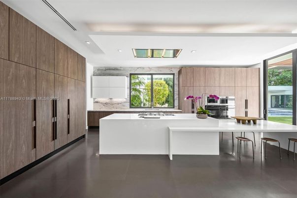 Interior, Kitchen, Marble Walls, Recessed Lighting, Stainless Steel Appliances