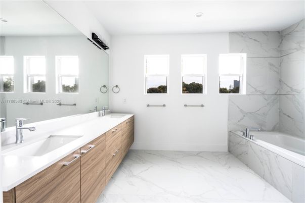 Bathroom, Dual Sink Vanities, Interior, Marble, Marble Walls, Recessed Lighting