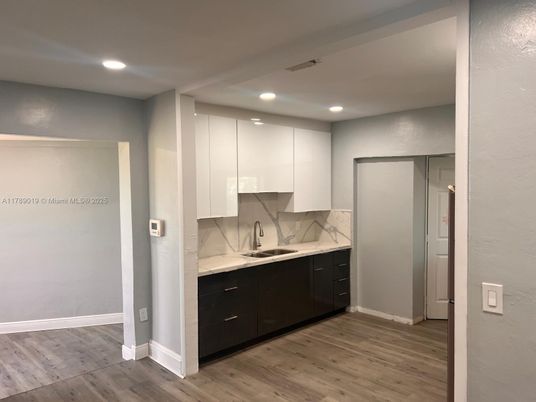 Interior, Kitchen, Marble Walls, Recessed Lighting, Wood Texture Flooring