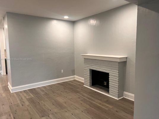 Empty room, Fireplace, Interior, Recessed Lighting, Wood Texture Flooring