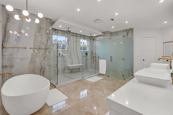 Bathroom, Free Standing Baths, Glass Shower, Interior, Marble Walls, Pendant Lights, Recessed Lighting
