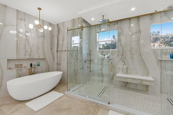 Bathroom, Free Standing Baths, Glass Shower, Interior, Marble Walls, Pendant Lights, Recessed Lighting