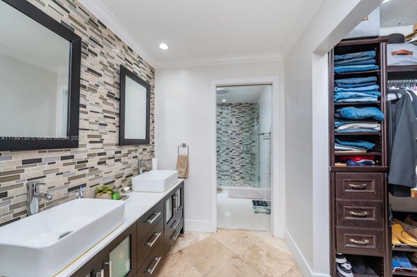 Bathroom, Dual Sink Vanities, Glass Shower, Interior, Recessed Lighting, Stone Walls
