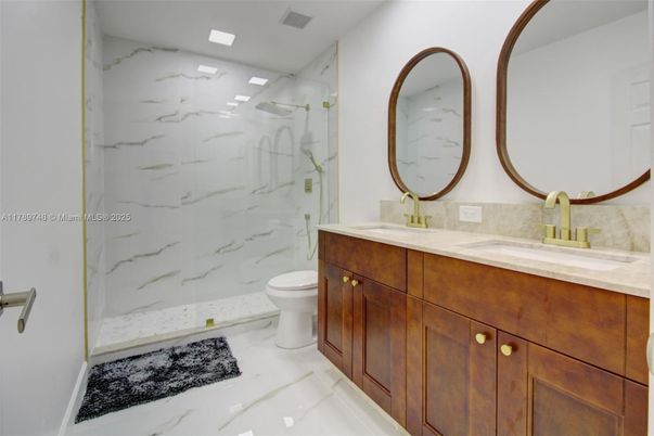 Bathroom, Dual Sink Vanities, Glass Shower, Interior, Marble, Marble Walls