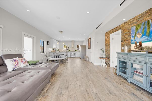 Dining room, Interior, Kitchen, Living room, Pendant Lights, Recessed Lighting, Stone Walls, Wood Texture Flooring