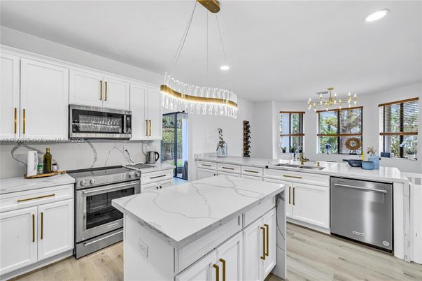 Interior, Kitchen, Pendant Lights, Recessed Lighting, Stainless Steel Appliances, Wood Texture Flooring