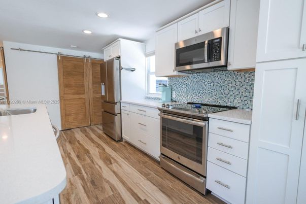 Interior, Kitchen, Recessed Lighting, Stainless Steel Appliances, Wood Texture Flooring