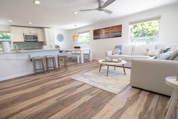 Dining room, Interior, Kitchen, Living room, Pendant Lights, Recessed Lighting, Stainless Steel Appliances, Wood Texture Flooring