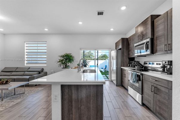 Interior, Kitchen, Living room, Recessed Lighting, Stainless Steel Appliances, Wood Texture Flooring
