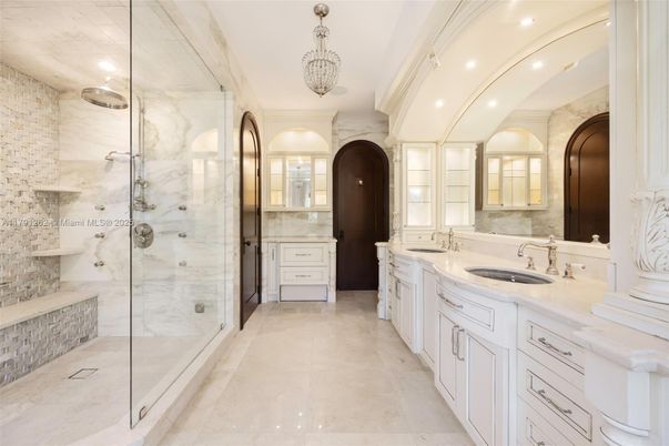 Bathroom, Dual Sink Vanities, Glass Shower, Interior, Marble Walls, Recessed Lighting