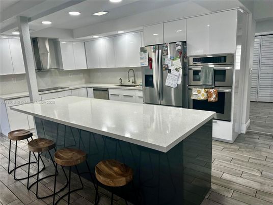 Interior, Kitchen, Recessed Lighting, Stainless Steel Appliances, Wood Texture Flooring