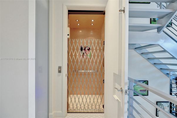 Elevator, Interior, Recessed Lighting, Wooden Ceilings, Wooden Walls