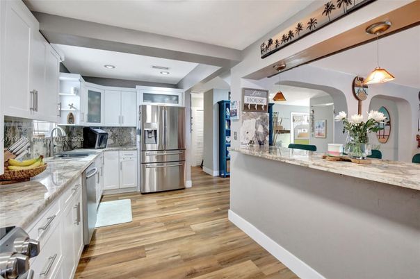 Interior, Kitchen, Pendant Lights, Recessed Lighting, Stainless Steel Appliances, Wood Texture Flooring