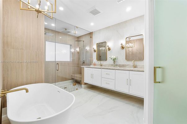 Bathroom, Dual Sink Vanities, Free Standing Baths, Glass Shower, Interior, Marble, Marble Walls, Recessed Lighting