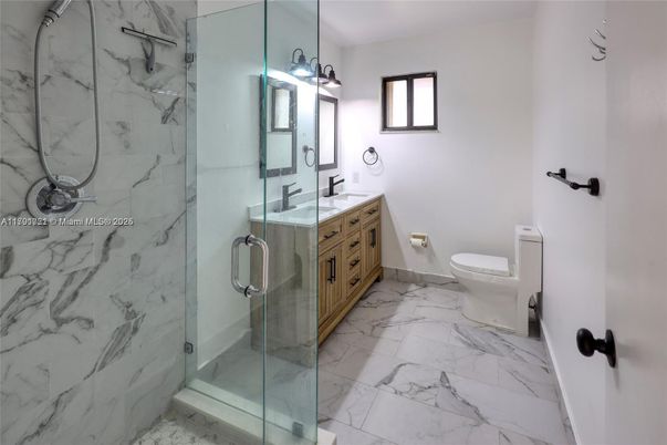 Bathroom, Dual Sink Vanities, Glass Shower, Interior, Marble, Marble Walls